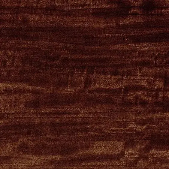 A close up image of a brown wood surface.