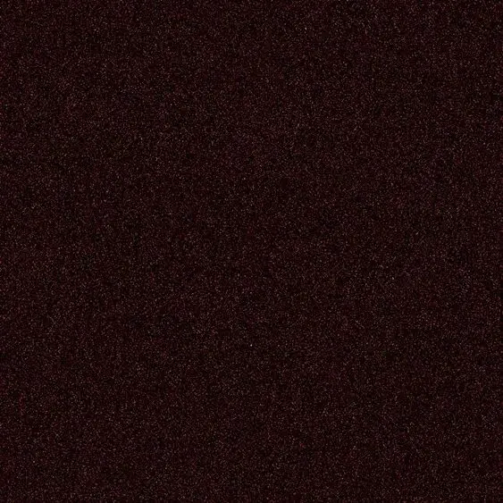 A close up image of a burgundy colored background.